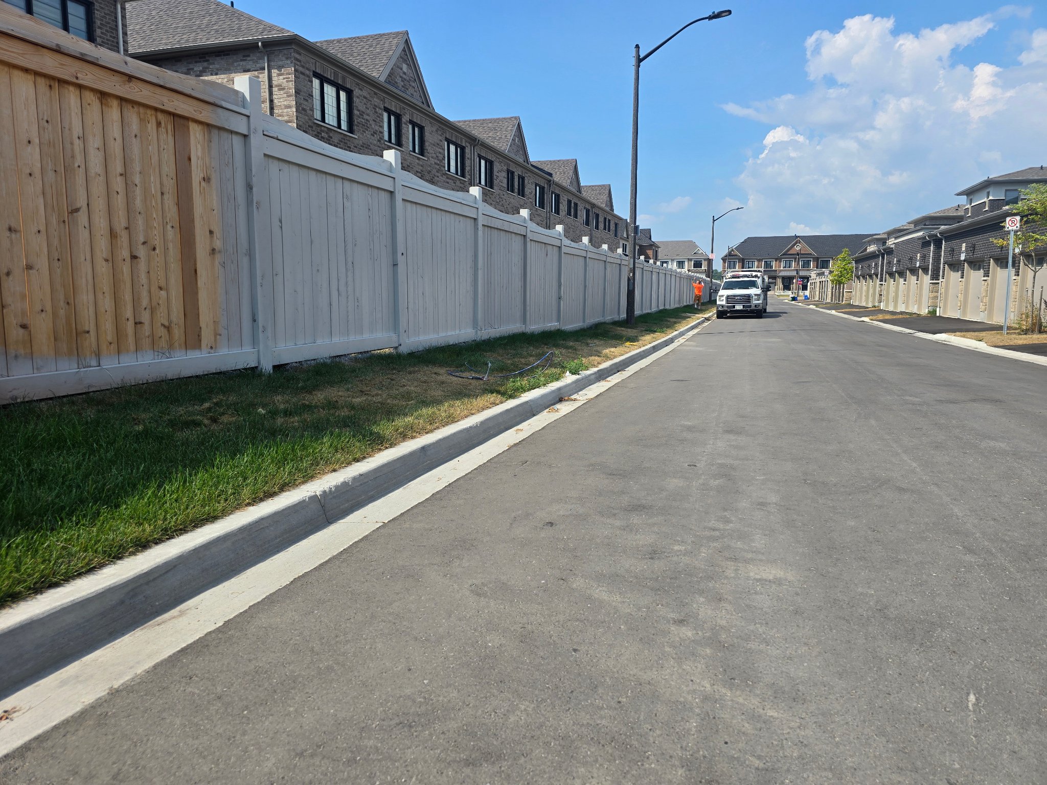 Professional fence staining GTA - commercial fence painting project Greater Toronto Area